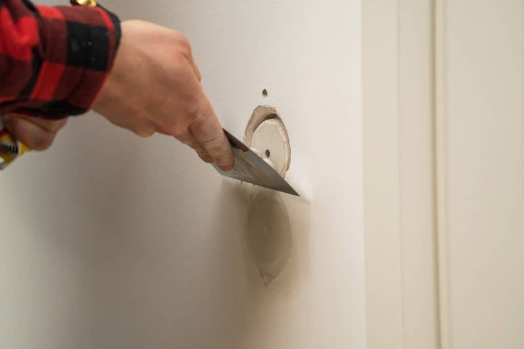 Comment reboucher un trou dans du placo : Guide facile